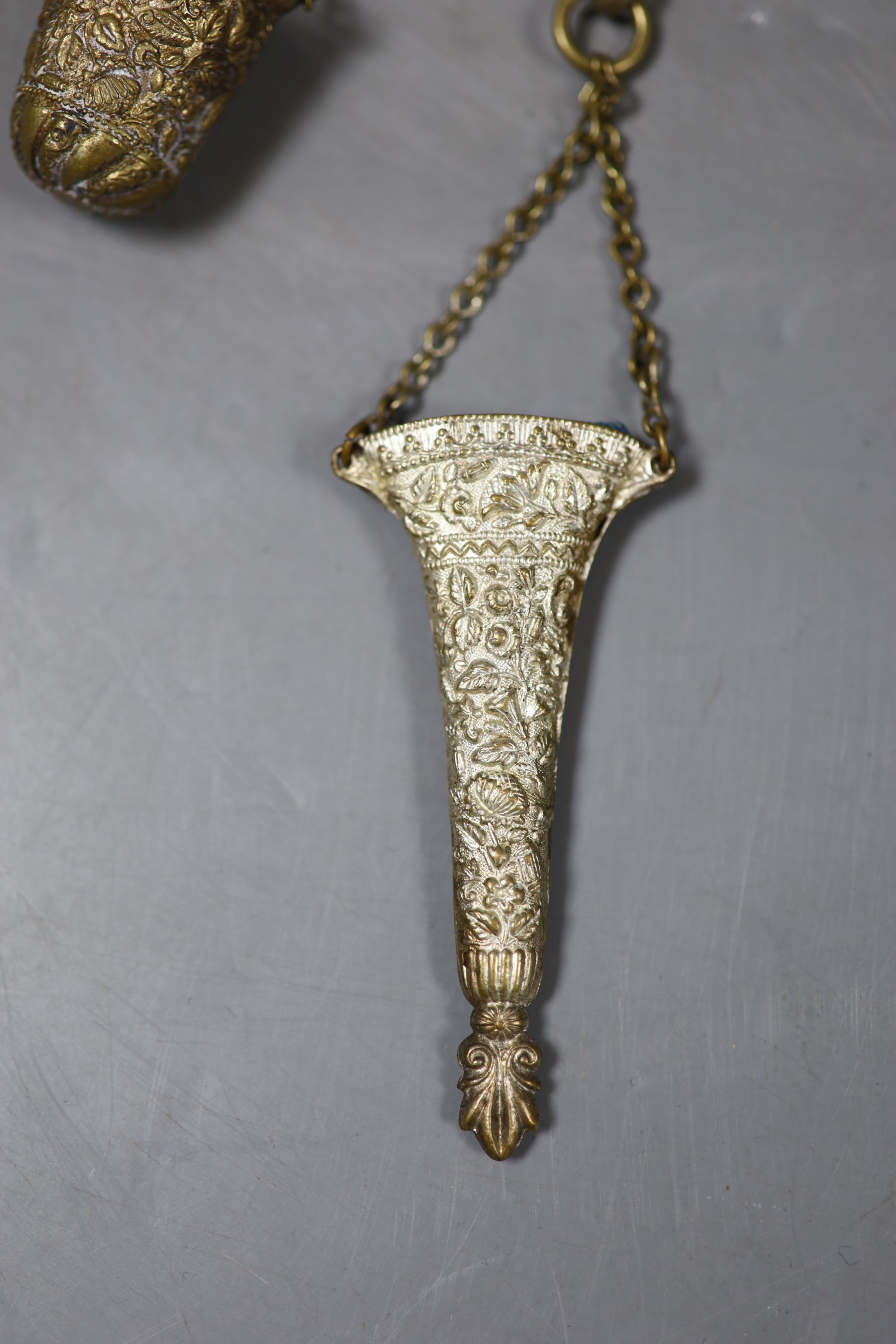 A Continental pierced gilt metal chatelaine hung with five accoutrements, 32cm